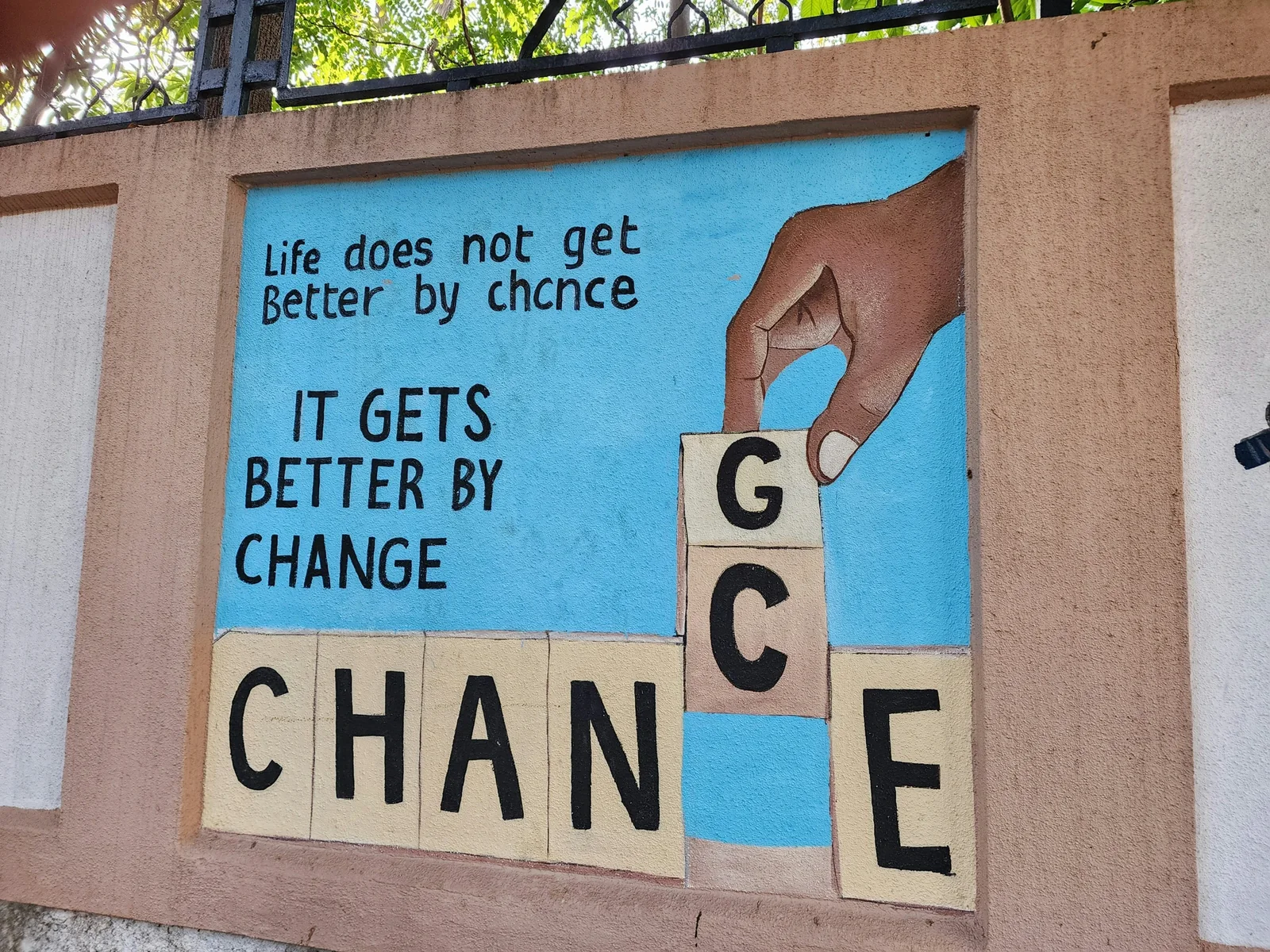 Wall mural showing the words: Life does not get better by chance, it gets better by change